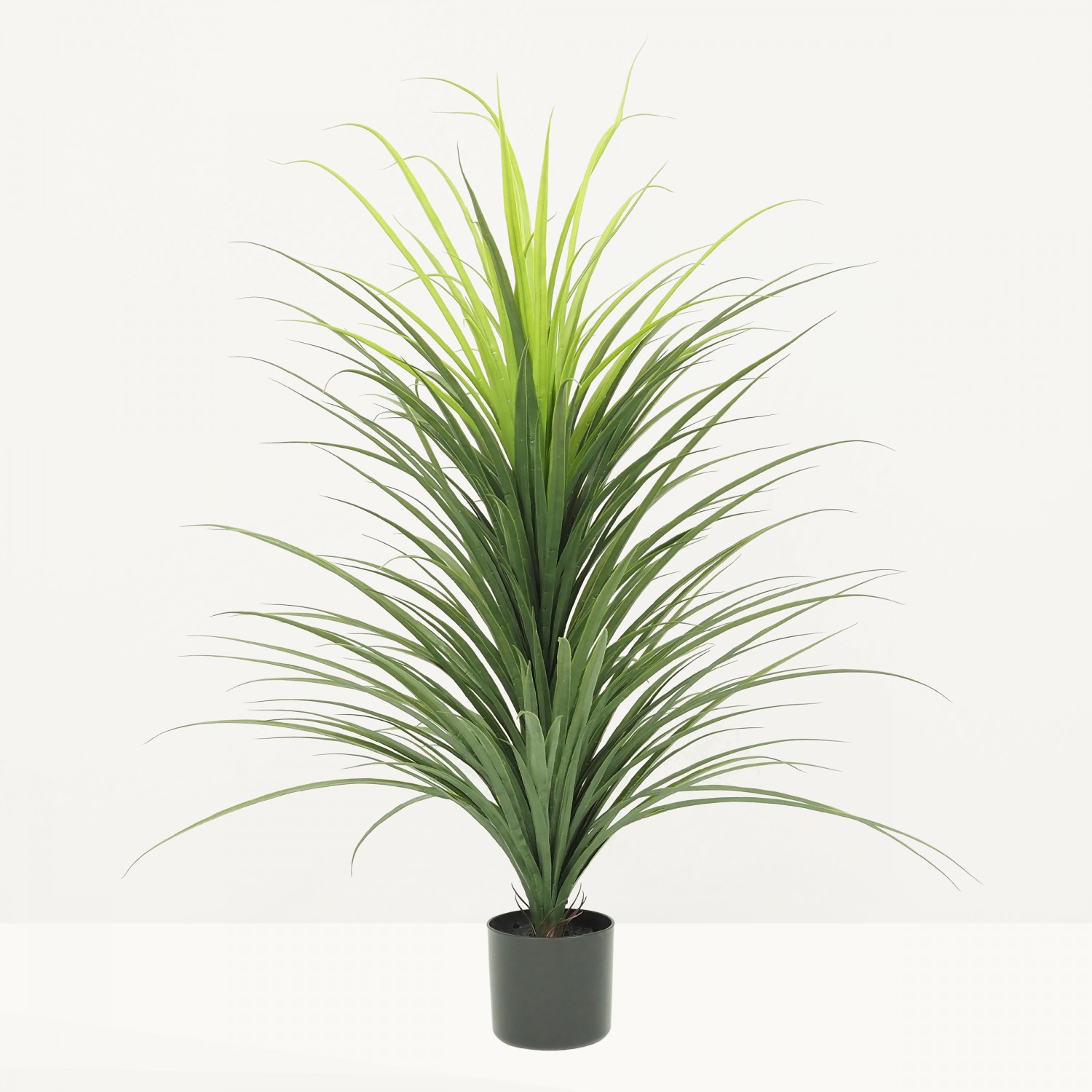 Dracena artificiel 120cm sur fond beige