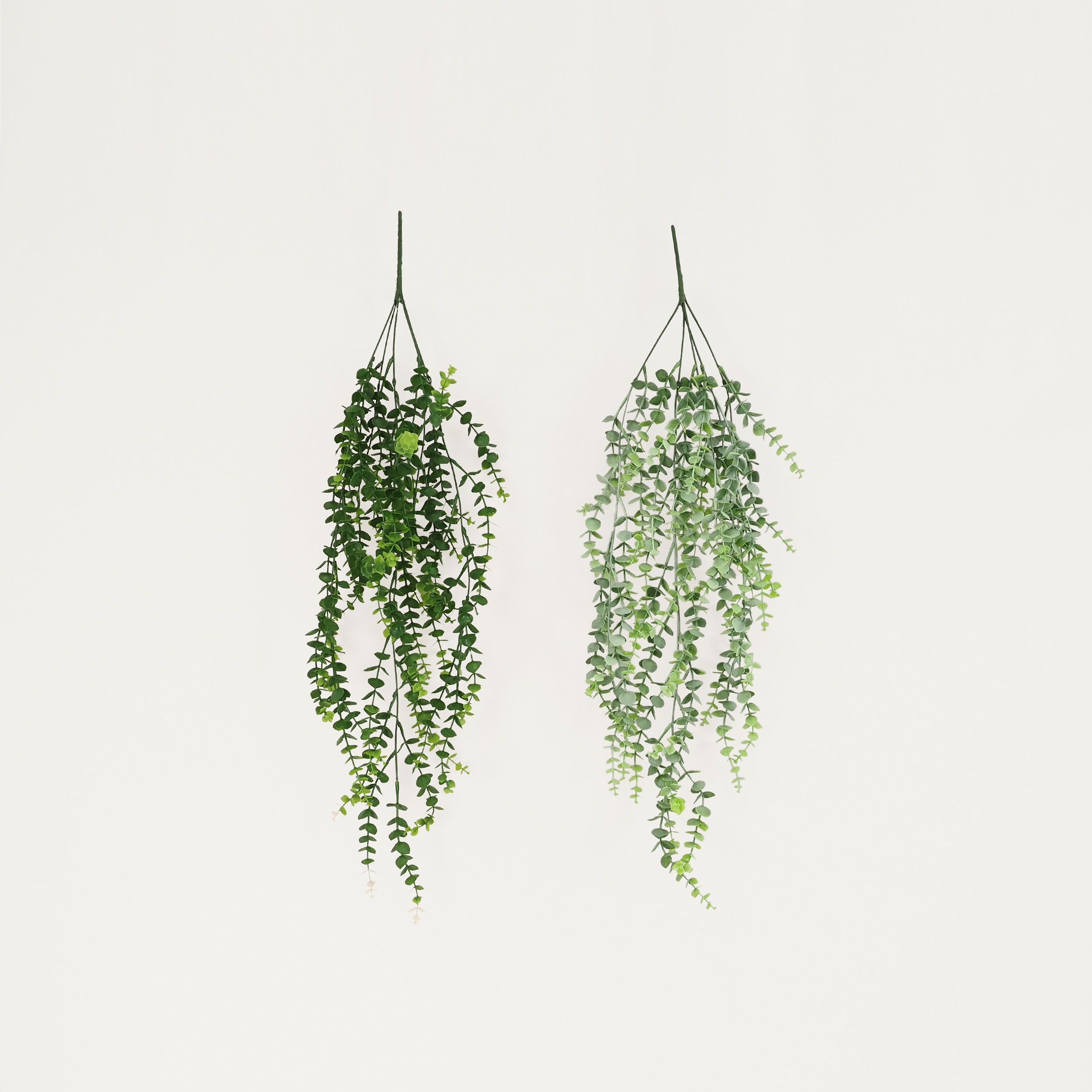 Chute plante artificielle d'eucalyptus 84cm lot de 2 sur fond beige
