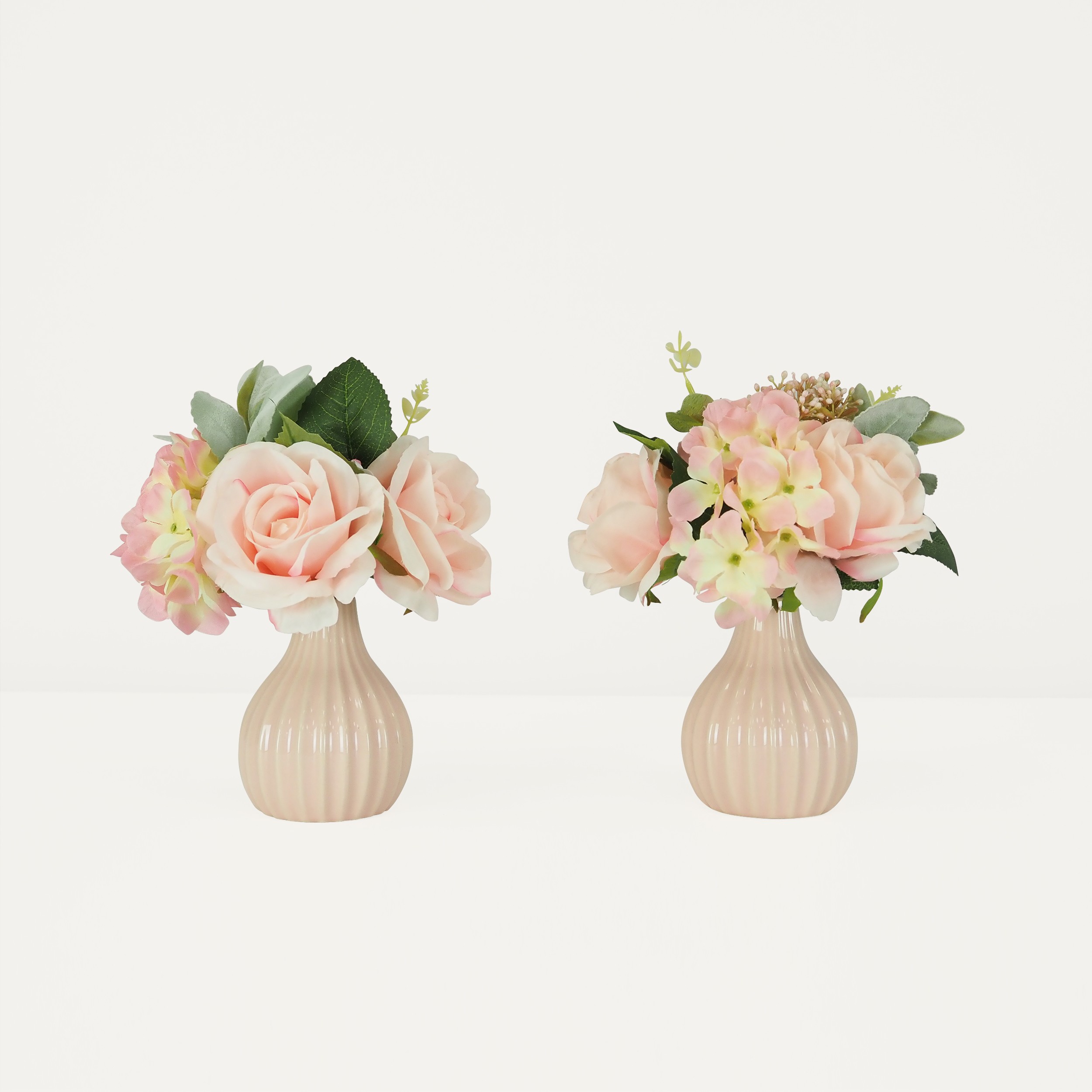 Bouquet fleurs artificiel en pot rose 25cm sur fond beige