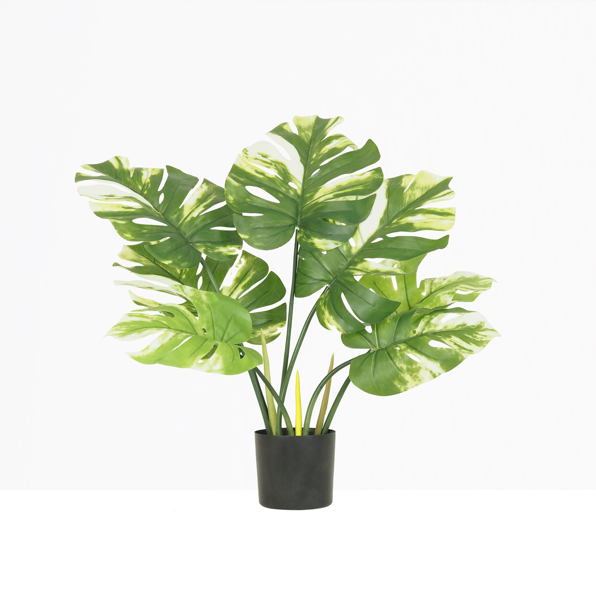 Monstera artificiel 40cm sur fond beige