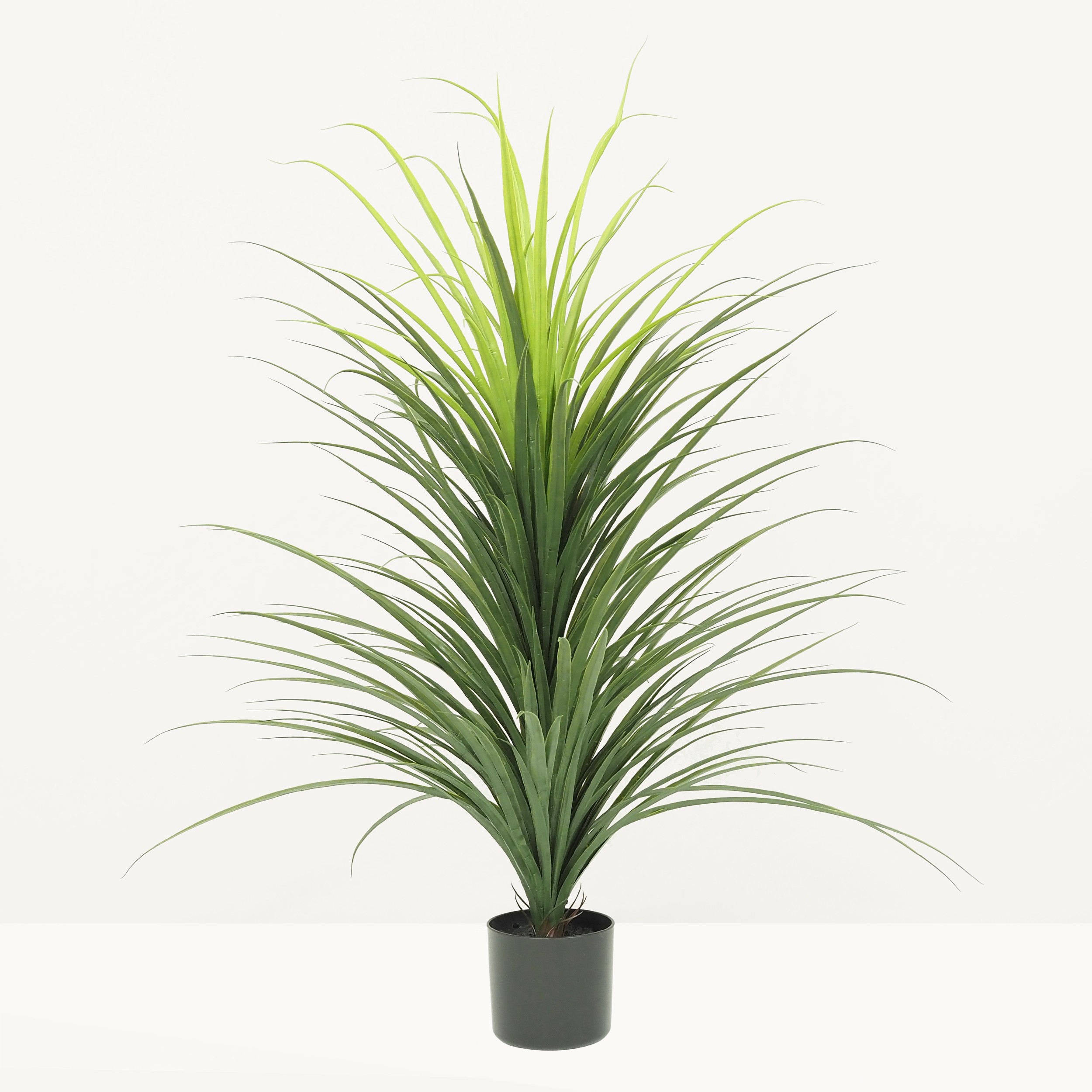 Dracena artificiel 120cm sur fond beige