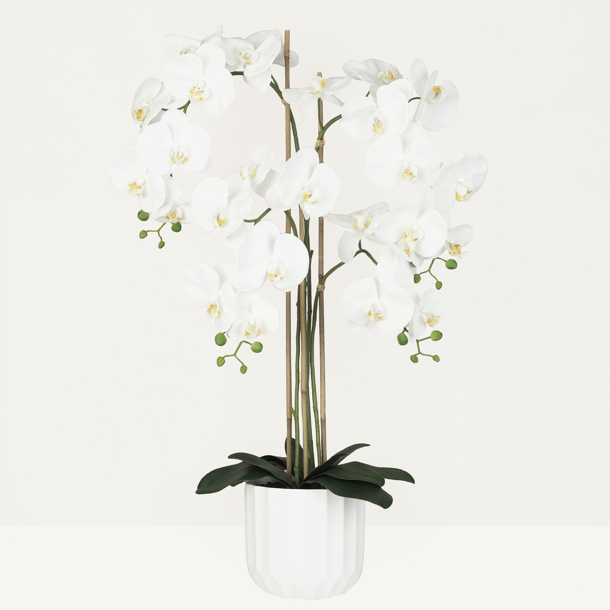 Orchidée artificielle toucher naturel 100cm sur fond beige