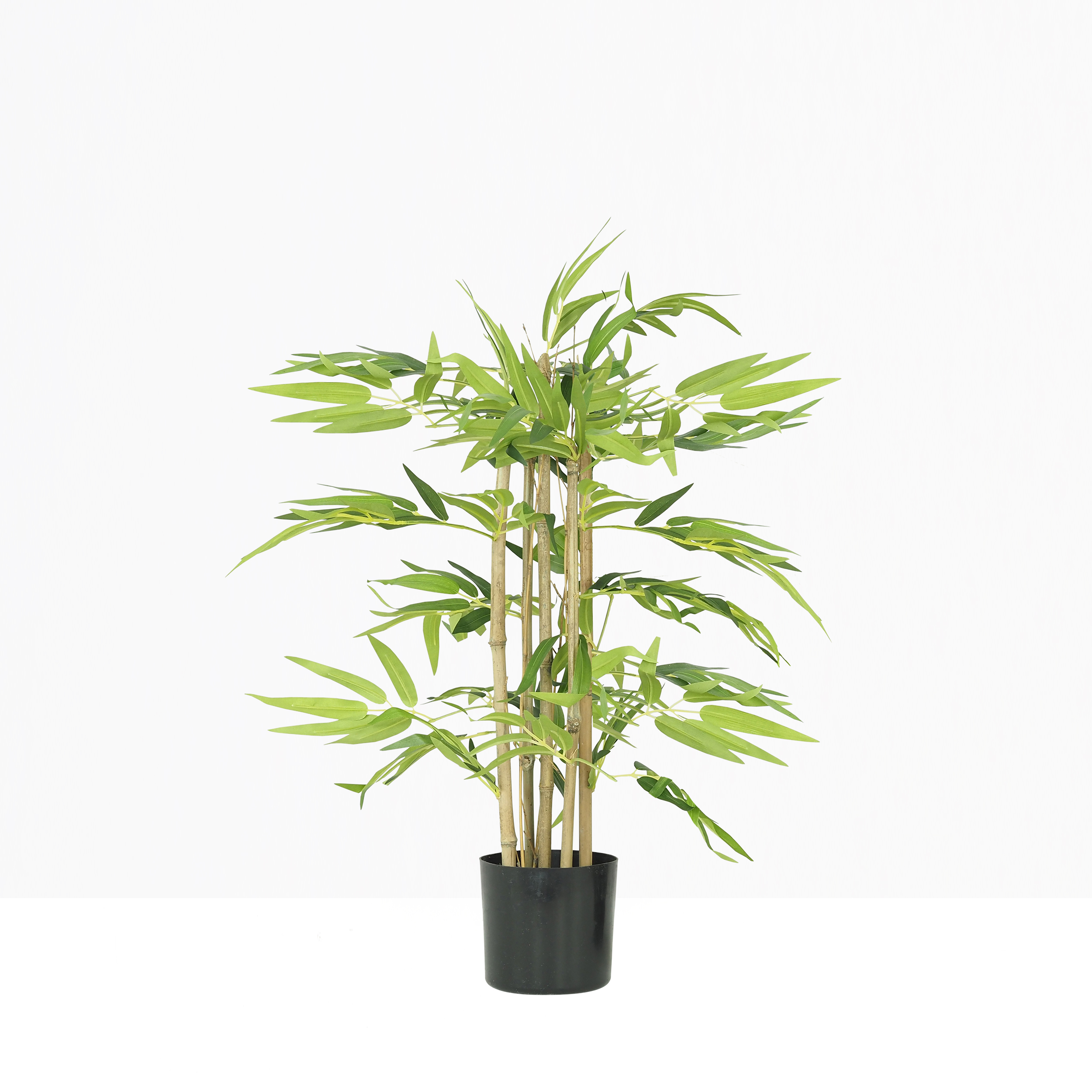 Bambou artificiel pot 60cm sur fond beige