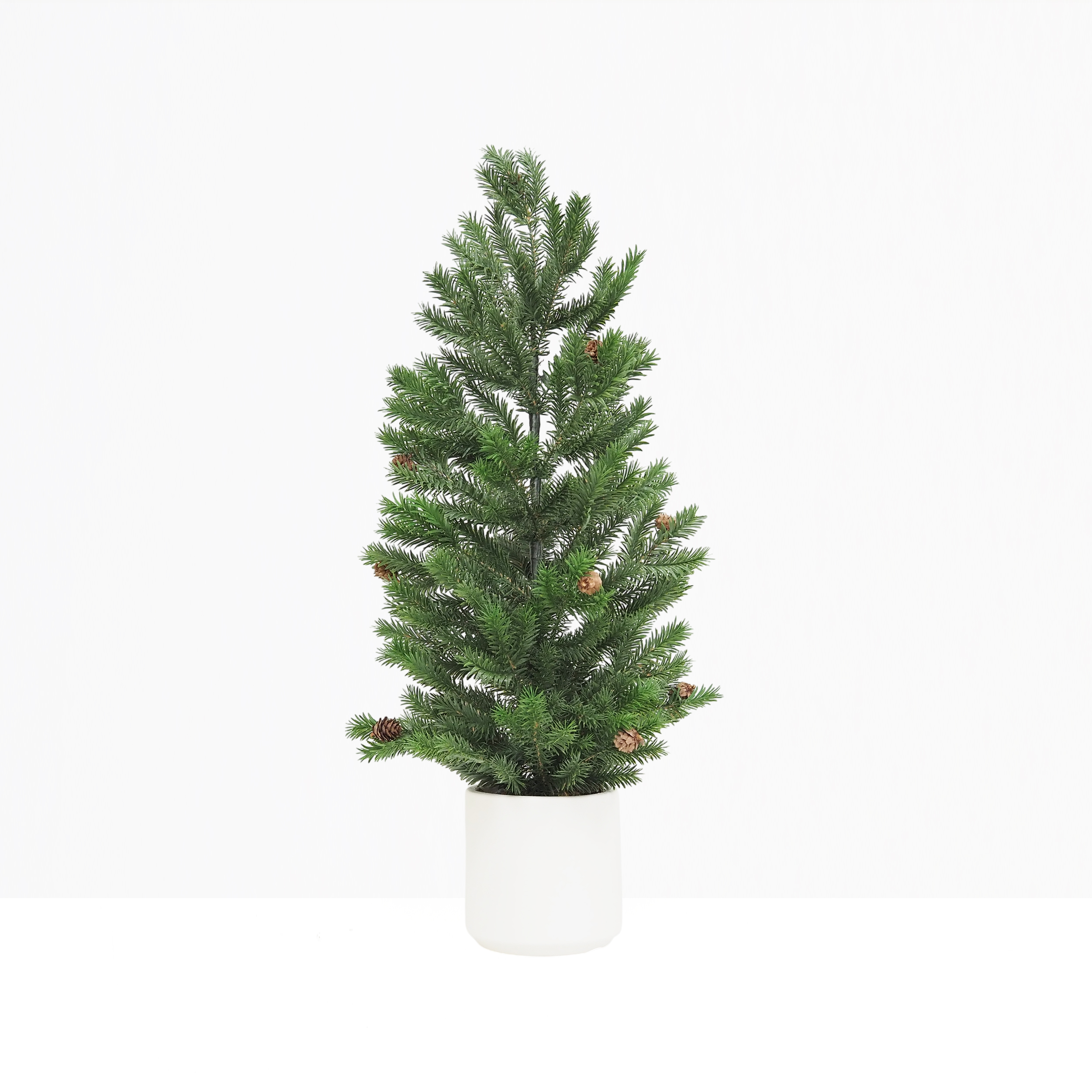 Sapin de Noël artificiel pot blanc 90cm sur fond gris